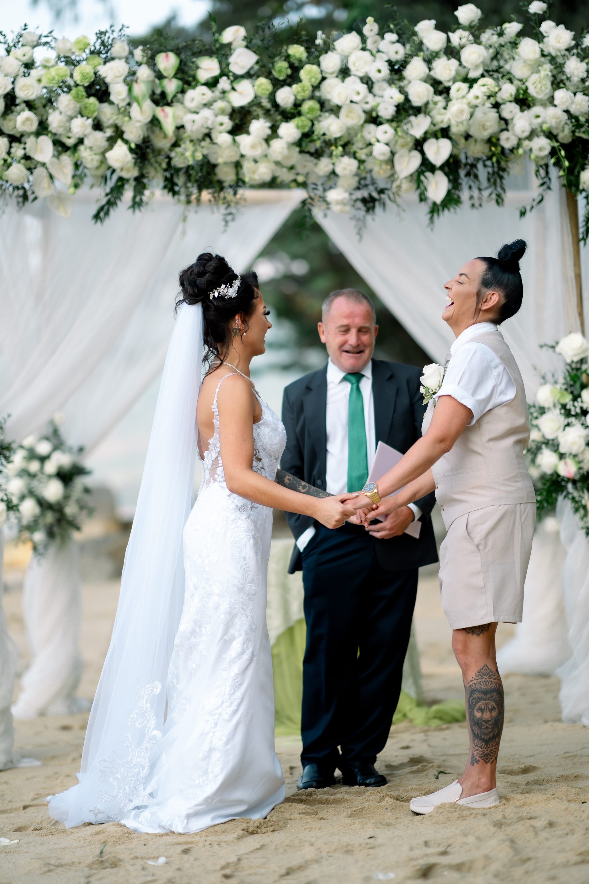 Beach arch elopement — Hua Beach elopement